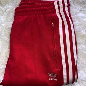 Red adidas pants